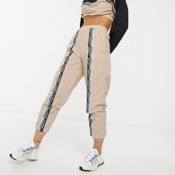 adidas Pants - Urban Outfitters X Adidas Originals High-Rise Berlin Tape Track Pant Jogger